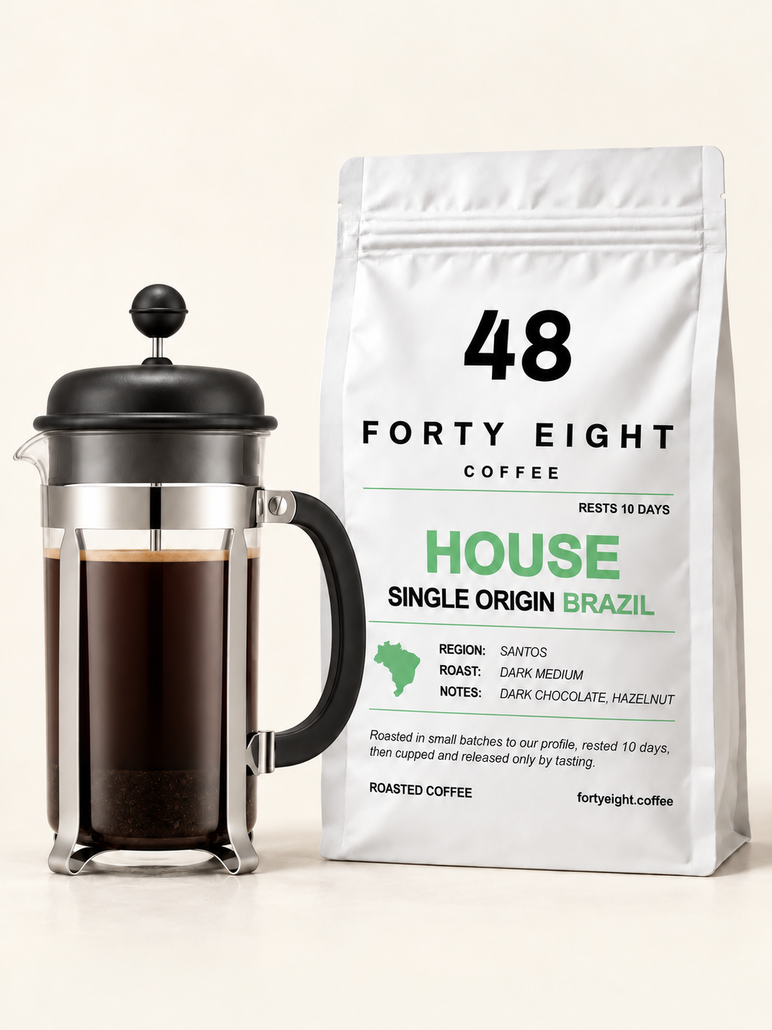 Cafetiere beside a white HOUSE Brazil 250g pouch