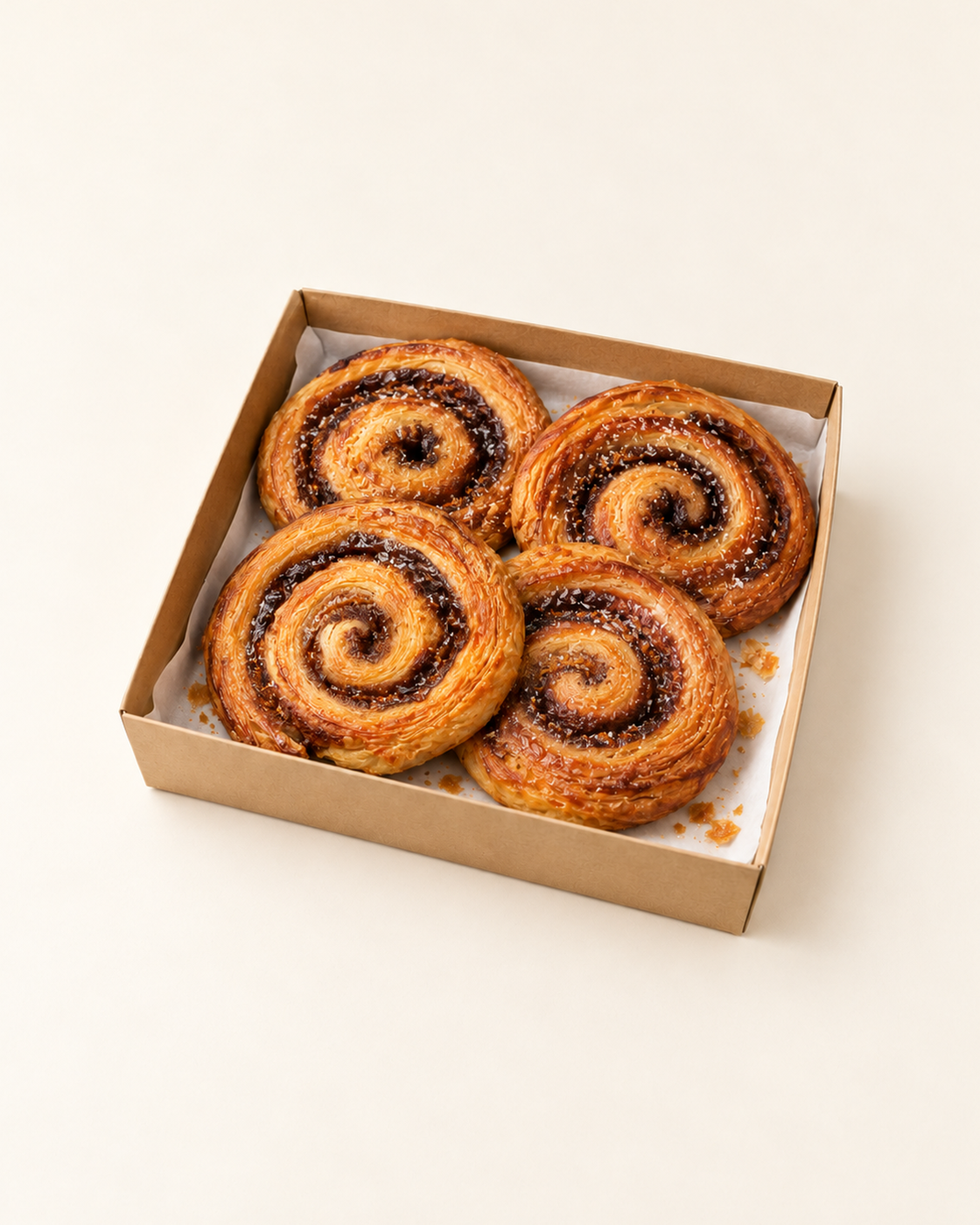 Illustrative serving suggestion: 4 Cinnamon Buns in a brown kraft catering platter.
