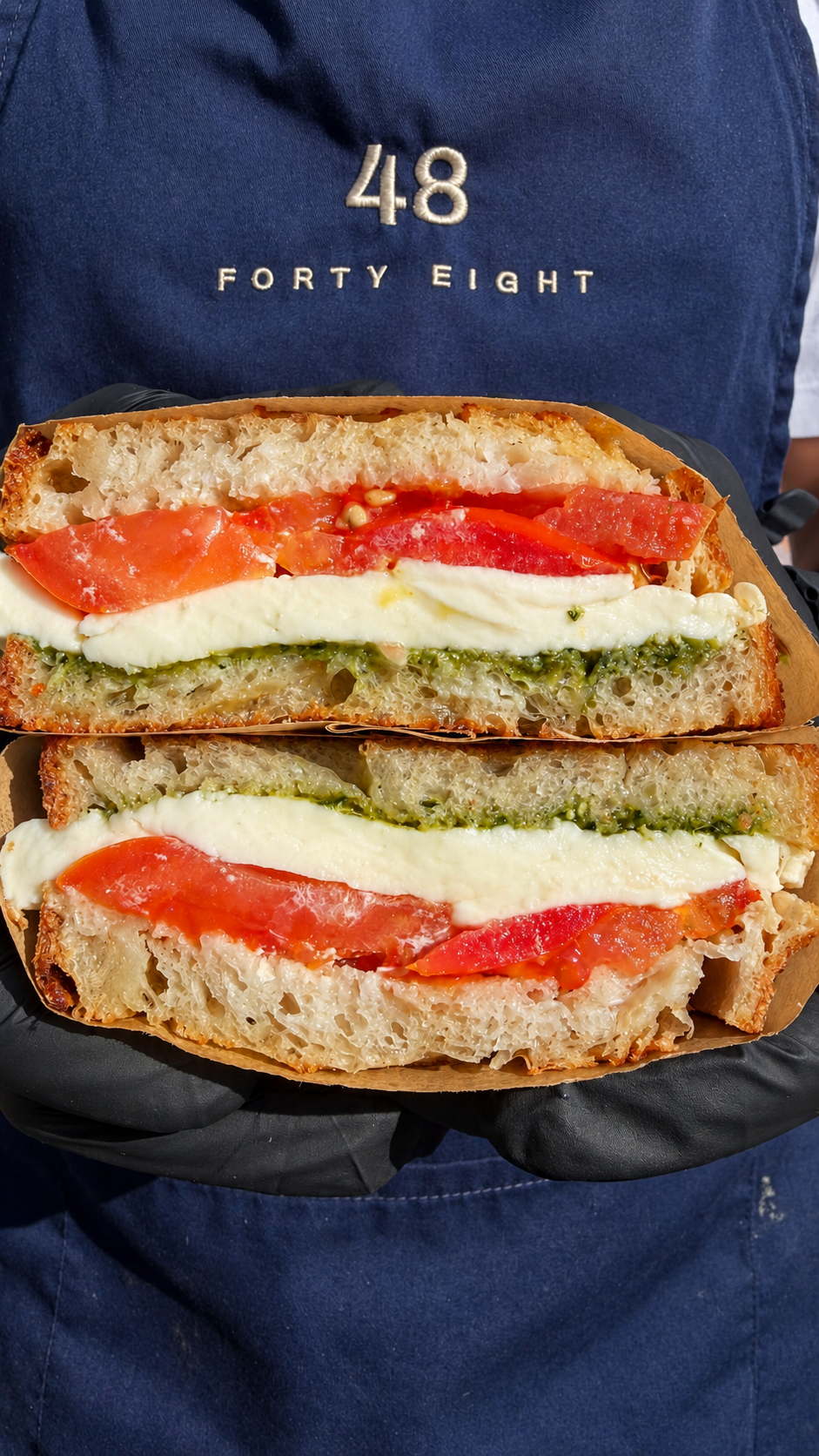 CAPRESE MELT — mozzarella, tomato and basil pesto on Forty Eight sourdough